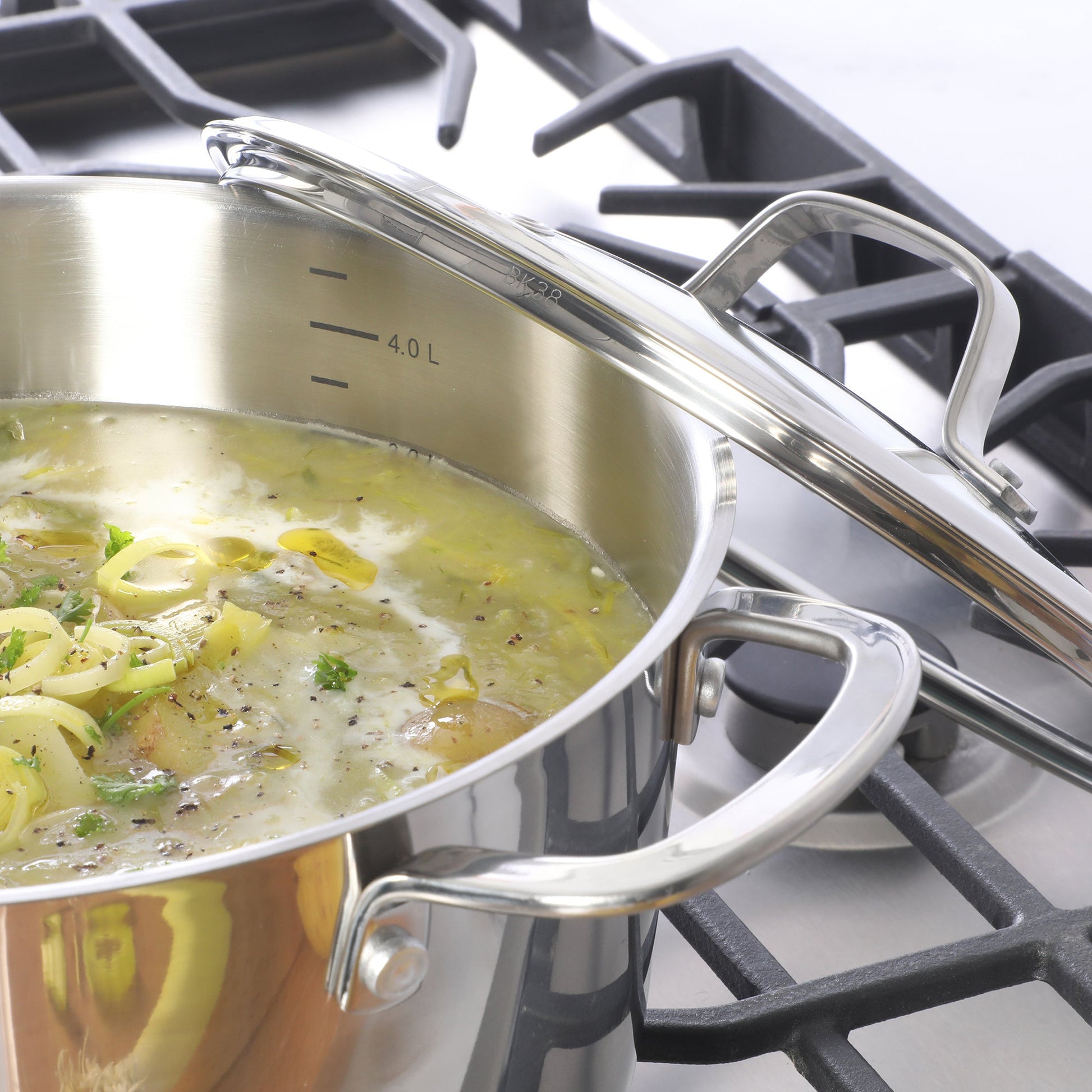Sur La Table Kitchen Essentials Chef's Deck 3-Piece 5.3-Quart Stainless Steel Dutch Oven with Steamer Insert & Glass Lid – Induction Ready, Tri-Ply Base, Polished Finish & Hollow Stay-Cool Handles