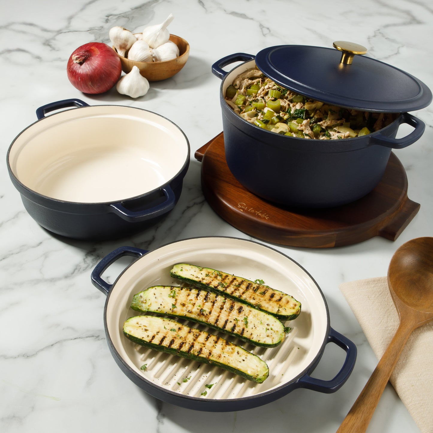 Sur La Table Kitchen Essentials 4-Piece Enameled Cast Iron Stackable Cookware Set, 5.3 Qt Dutch Oven with Lid, Braiser & Grill Pan, Navy Blue, Gold Knob Oven Safe to 500°F, Induction Compatible